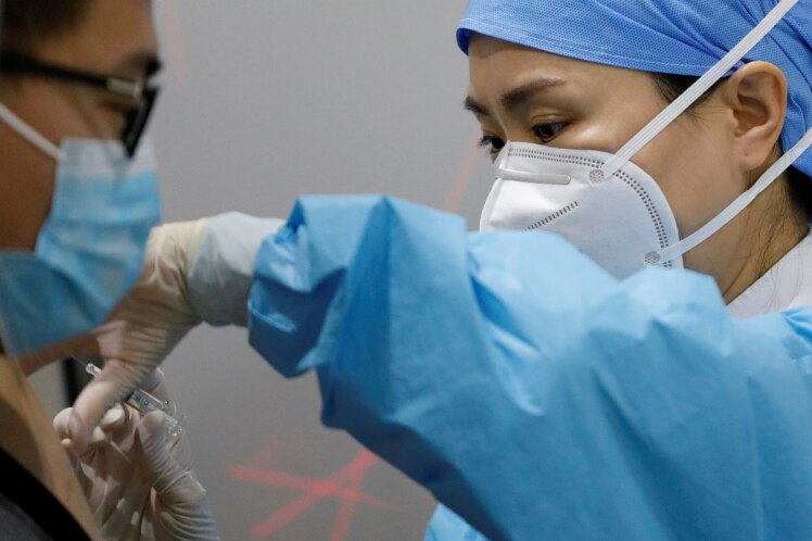 پایتخت چین تزریق دوز تقویتی واکسن کرونا را برای برخی از کارگران اجباری کرد